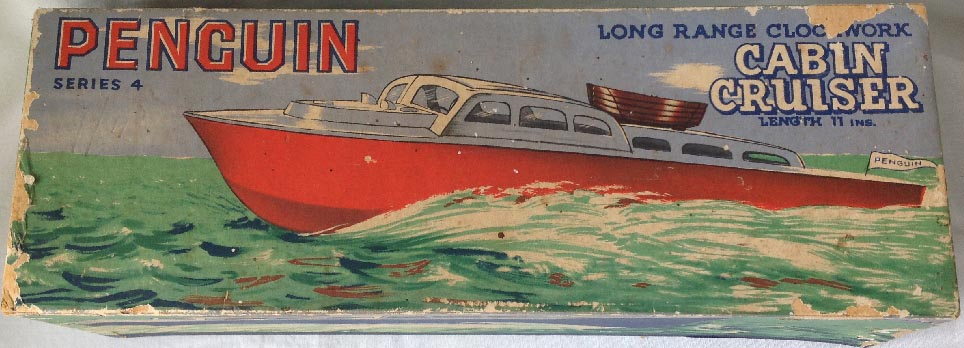 boxed circa 1950's New Zealand made Lines Brothers Triang clockwork wind up Penguin Cabin Cruiser boat toy